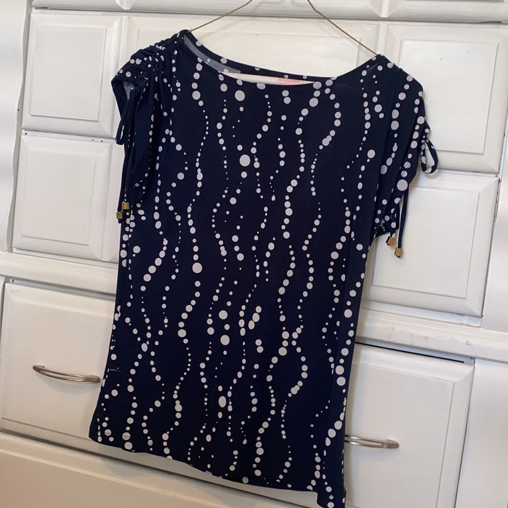 Navy and white dotted blouse